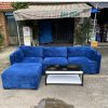 Bộ sofa chữ l nệm bọc vải màu xanh kèm bàn