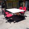 Bộ bàn làm việc 1m4 kèm 4 ghế bọc vải màu đỏ thanh lý
